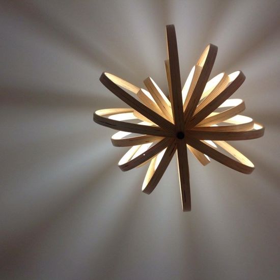 Lampadario moderno per soggiorno design cerchi in legno chiaro