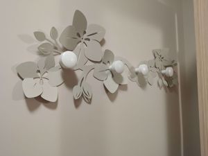 Appendiabiti da muro fiore di loto moderno metallo avorio