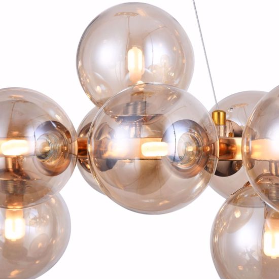 Lampadario design moderno per soggiorno metallo oro sfere vetro ambra trasparente