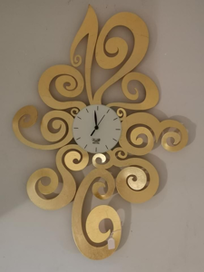 Orologio da parete design foglia oro contemporaneo