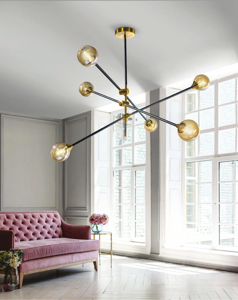Lampadario design oro 6 luci orientabili sfere ambra per soggiorno