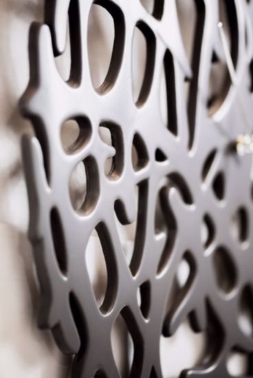 Orologio design da parete moderno ceramica traforata grigio per soggiorno
