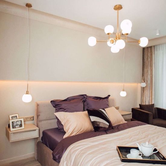 Lampadario moderno per soggiorno oro rosa 12 sfere vetro bianche