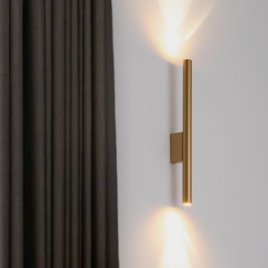 Applique da parete cilindro oro luce biemissione
