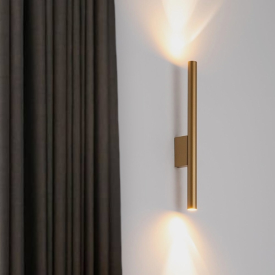 Applique da parete cilindro oro luce biemissione
