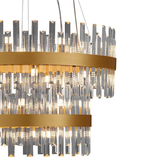 Lampadario oro moderno con cristalli molati trasparenti