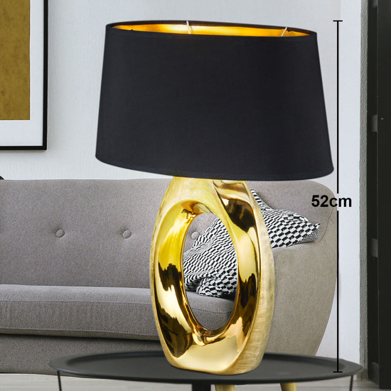 Lampada da tavolo in ceramica oro lucido paralume nero