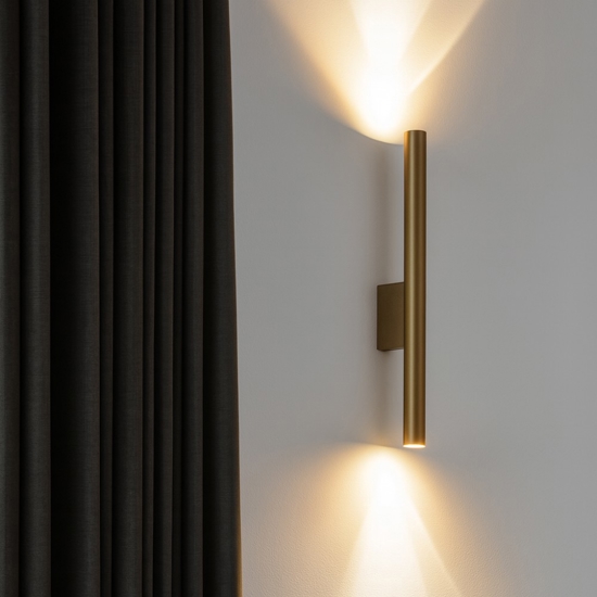 Applique da parete cilindro oro luce biemissione
