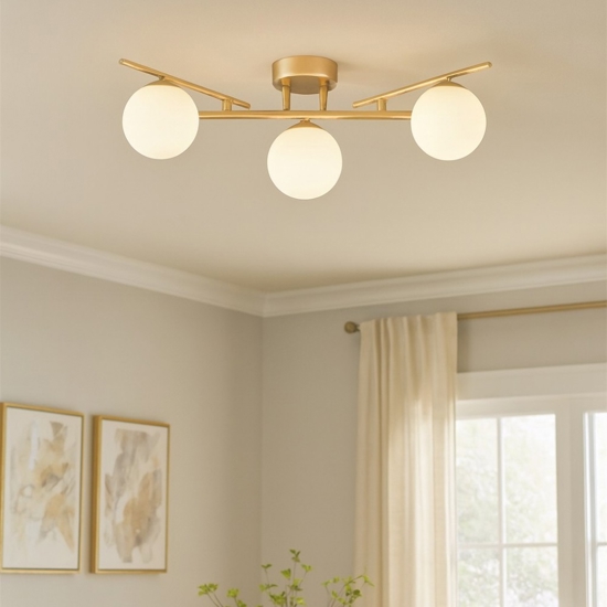 Plafoniera moderna atlas pl3 ideal lux oro opaco tre sfere vetro bianche