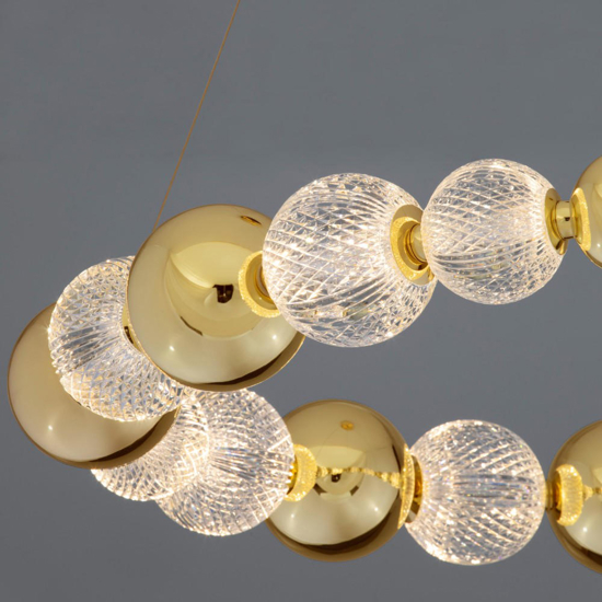 Lampadario sfere oro trasparenti per soggiorno moderno