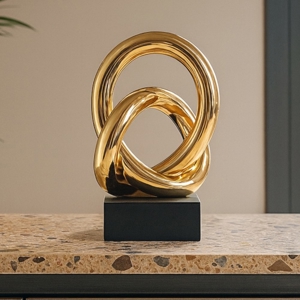 Bongelli preziosi nodo scultura oro base nera