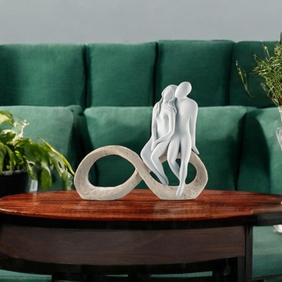 Scultura soprammobile moderno h23 coppia infinito nocciola Scultura soprammobile moderno h23 coppia infinito nocciola