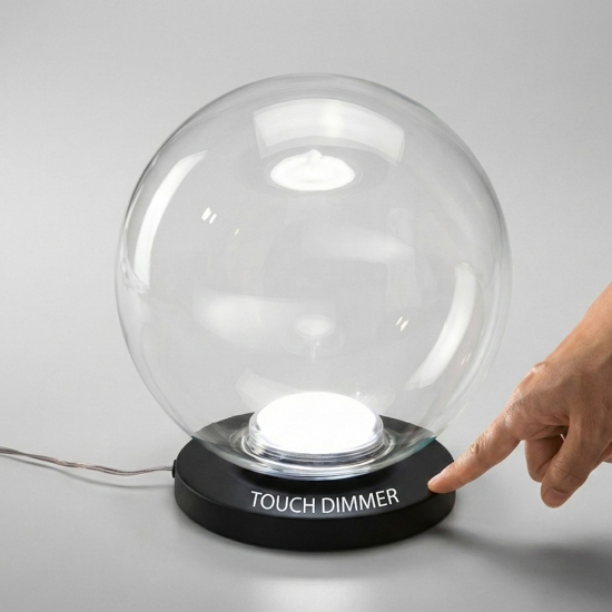 Lampada da comodino sfera di vetro trasparente fabas luce ariel