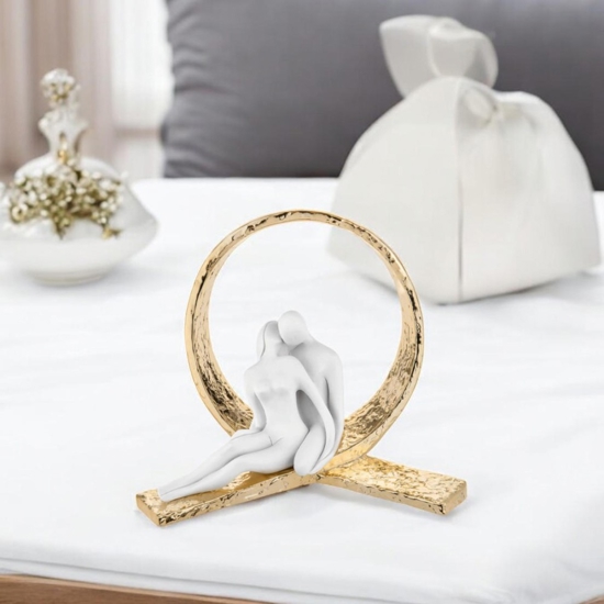 Scultura bomboniera coppia vortice oro bongelli preziosi