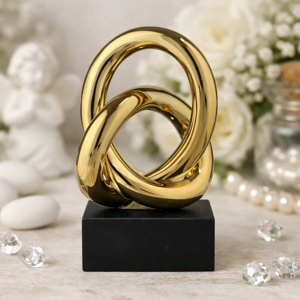 Bomboniera bongelli preziosi soprammobile nodo scultura oro nero