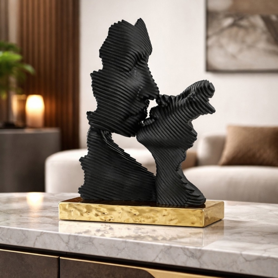 Scultura da tavolo bacio stilizzato nero oro bongelli preziosi