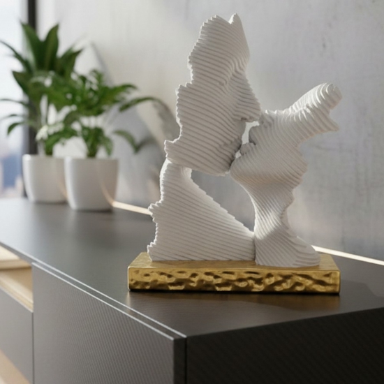 Scultura da tavolo bacio stilizzato oro moderna bongelli preziosi