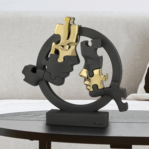 Scultura soprammobile volti puzzle nero oro bongelli preziosi