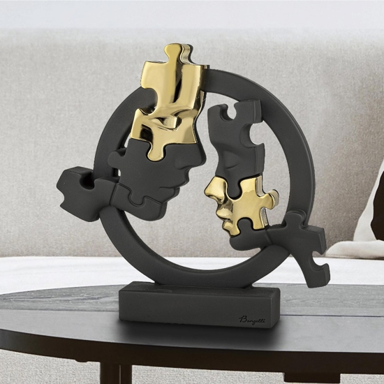 Scultura soprammobile volti puzzle nero oro bongelli preziosi