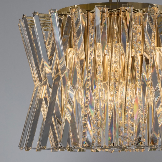 Lampadario design oro satinato rotondo con cristalli elegante