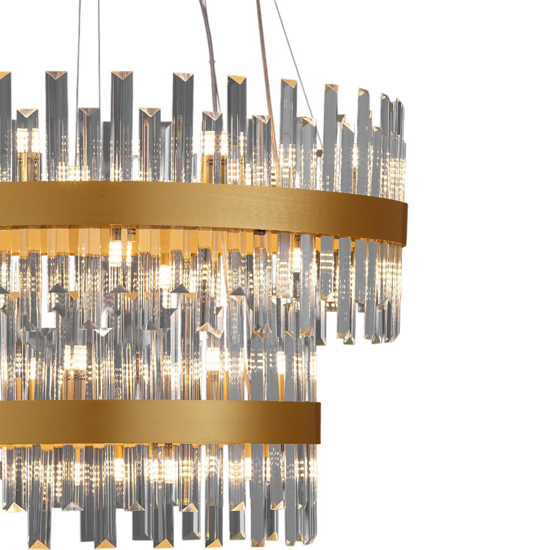 Lampadario oro moderno con cristalli molati trasparenti