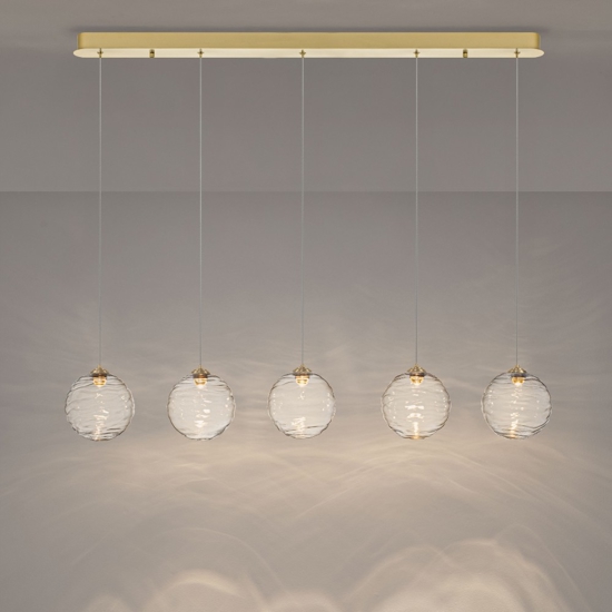 Lampadario oro con pendenti sfere di vetro ondulato trasparente per sala da pranzo