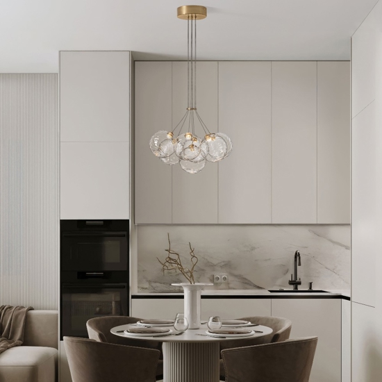 Lampadario oro sfere raggruppate trasparenti ondulate per sala da pranzo contemporanea