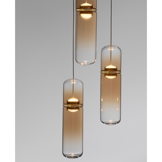 Lampadario oro con capsule pendenti in vetro ambra per camera da letto moderna