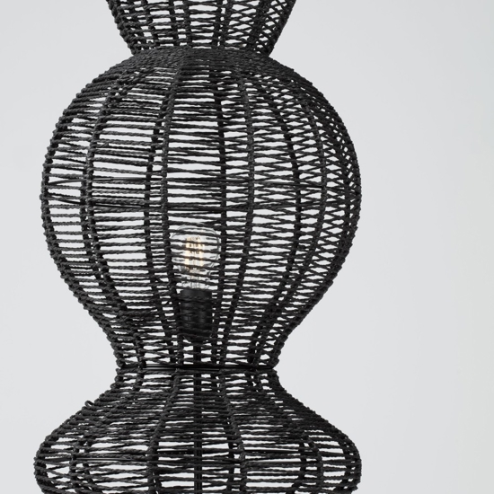 Piantana di rattan nero intrecciato per soggiorno
