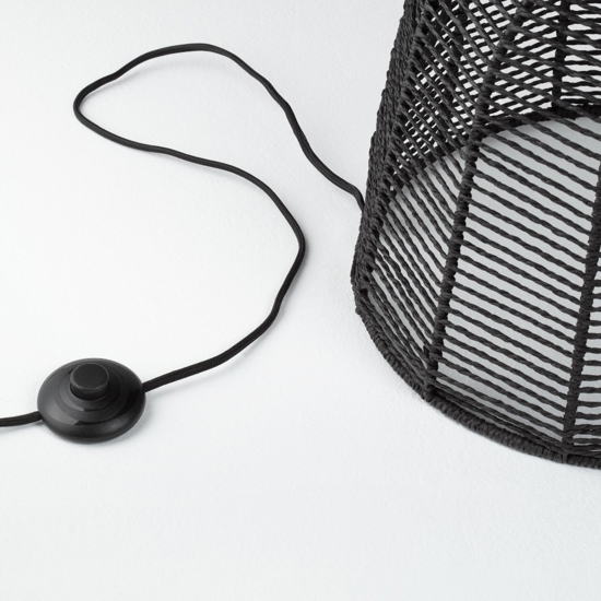 Piantana di rattan nero intrecciato per soggiorno