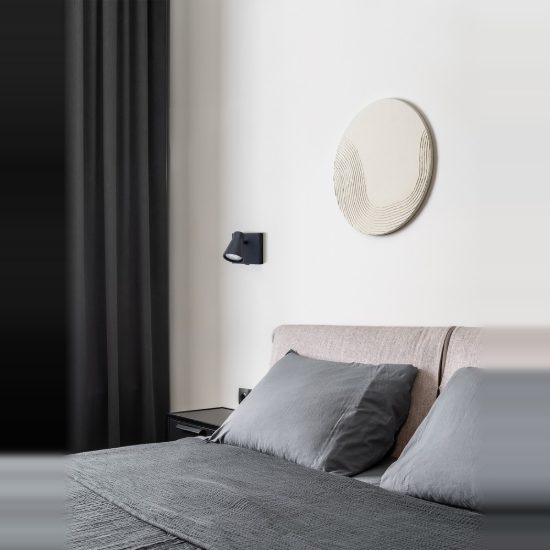 Applique con faretto moderno per disimpegno forma cono nero orientabile