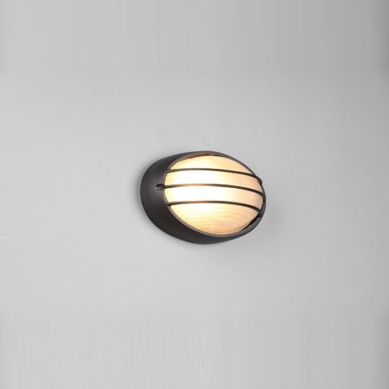 Applique piccola da esterno ip44 moderna ovale nera con griglia e vetro satinato