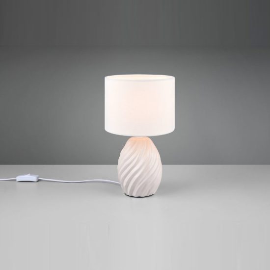 Abat-jour per comodino in ceramica bianca a onde con paralume in tessuto bianco