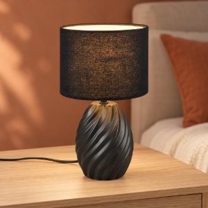 Abat-jour per comodino in ceramica nera a onde con paralume in tessuto nero