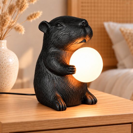 Abat-jour per comodino a forma di capibara nero con sfera in vetro bianco