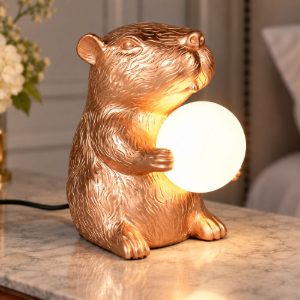 Abat-jour per comodino a forma di capibara oro con sfera in vetro bianco