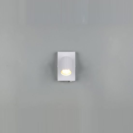 Applique per comodino camera da letto bianca con cilindro rigato interruttore