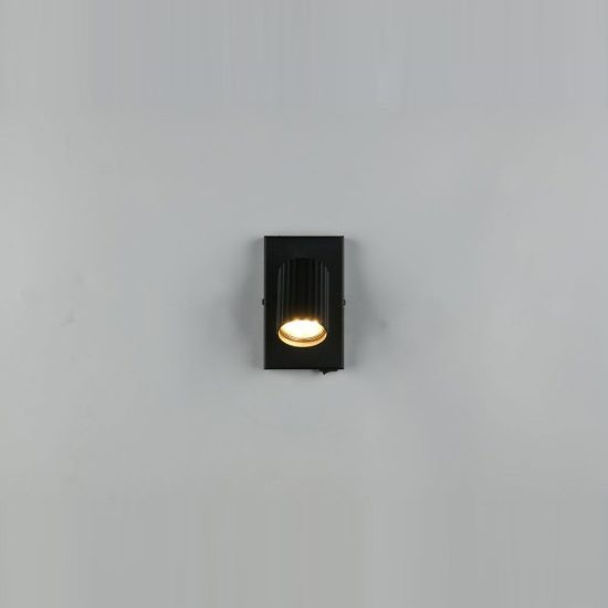 Applique per comodino camera da letto nera con cilindro rigato interruttore